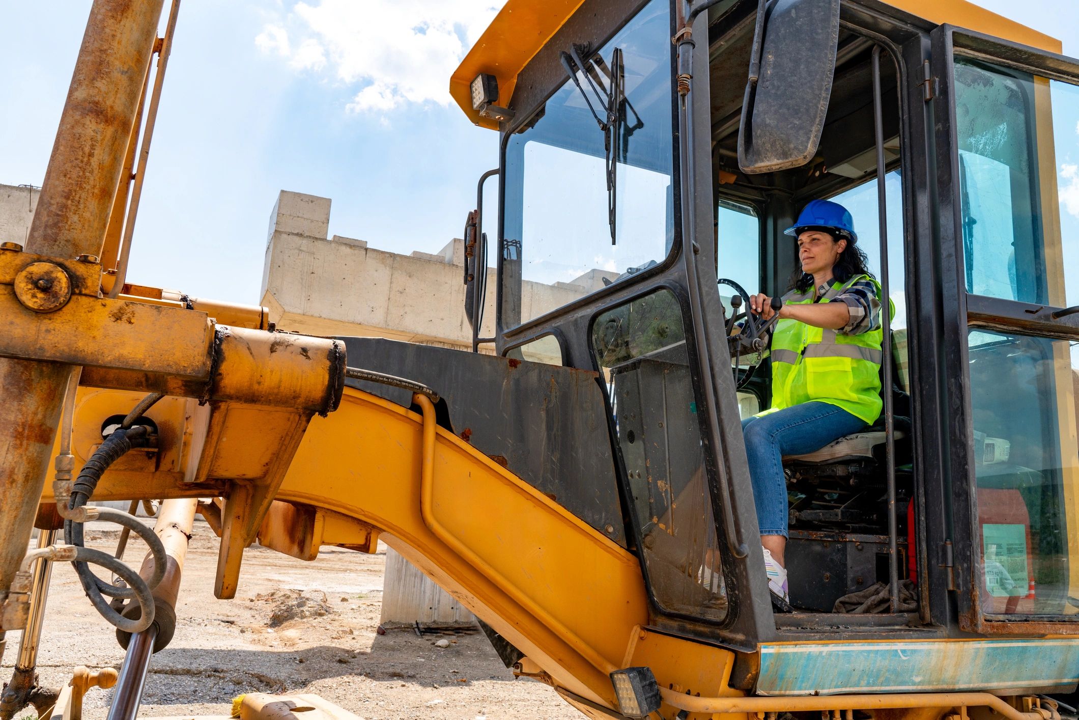 Heavy equipment professional inspecting machinery